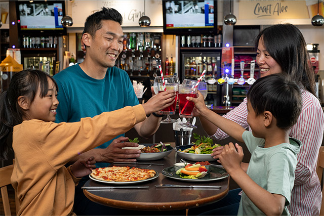 A family enjoying a meal in The Boathouse Bar & Restaurant