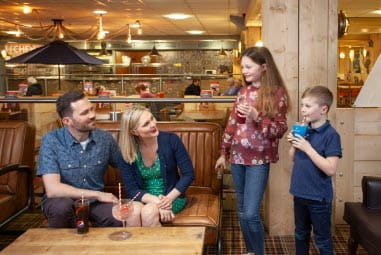 A family enjoying a meal at the restaurant