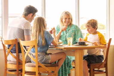 a family enjoying a meal at the restaurant