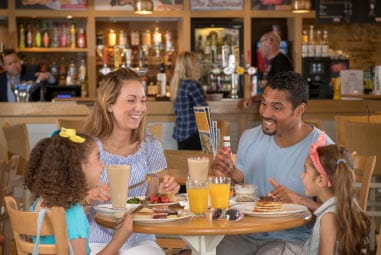 a family enjoying a meal at the restaurant