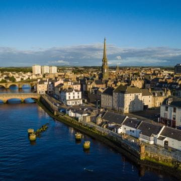 a quaint town alongside a river
