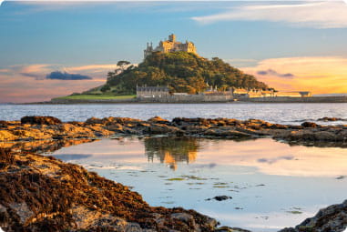 Sunset over St Michael's Mount island off the coast of Marazion in Cornwall