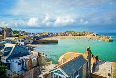 Overlooking rooftops towards the harbour in St Ives in Cornwall