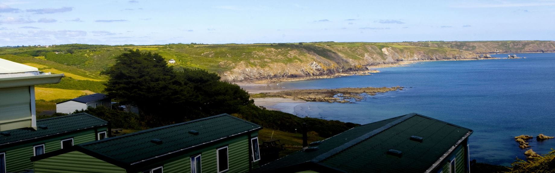 The sea view over the top of a Park Dean caravan