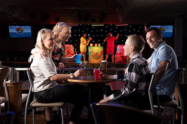 A family watching a show at Skipsea Sands Holiday Park