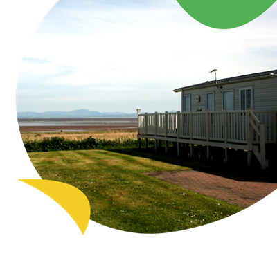 A holiday caravan looking out to sea at Southerness Holiday Park