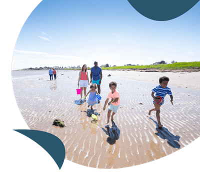 Family on the beach at Southerness holiday park