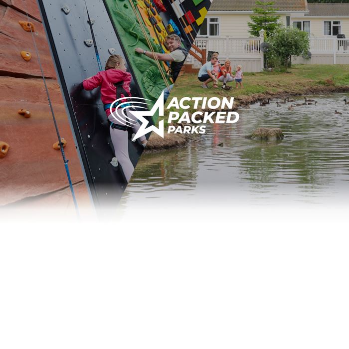 Outdoor climbing wall and the lake at Southview Holiday Park
