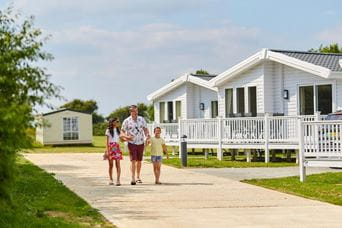 Family walking outside a holiday park