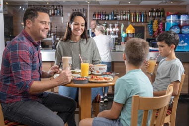 a family enjoying a meal at a restaurant