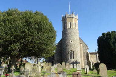 A Church and church yard on a sunny day