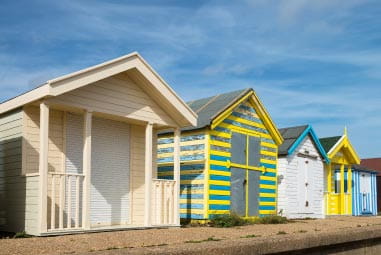 colourful sea side beach huts