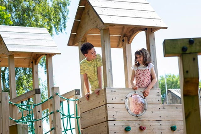 Kids playing on the adventure playground at Todber Valley