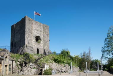 Brick fort on a mound with union jack flag flying