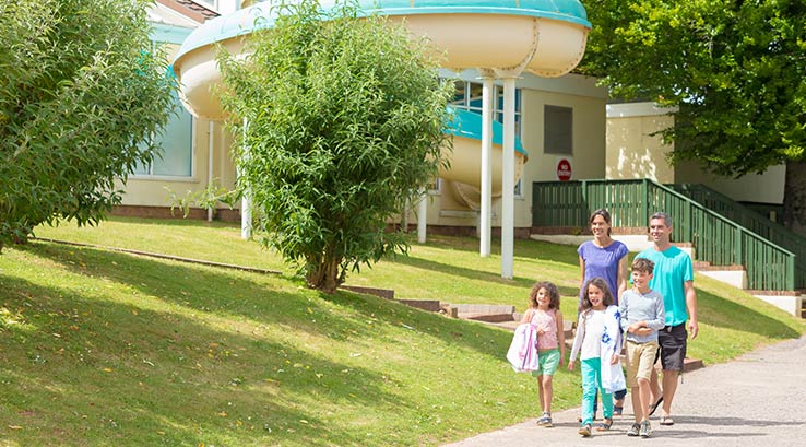 A family walk in the sunshine at Torquay Holiday Park