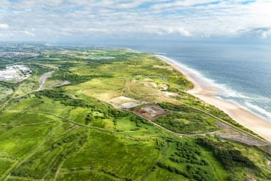 Green countryside and the Welsh coast
