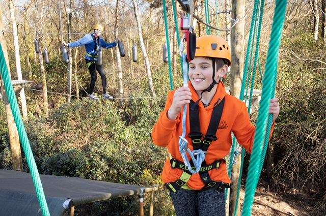 Child on the high ropes course at Warmwell