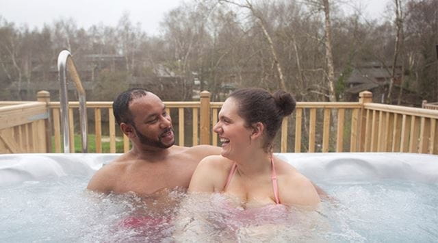 couple relaxing in a hot tub