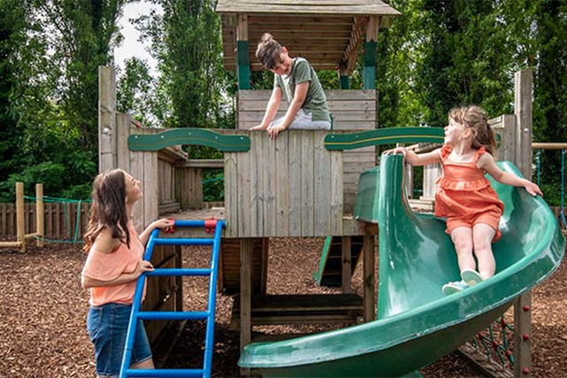 Kids playing on the playground at Weeley Bridge Holiday Park