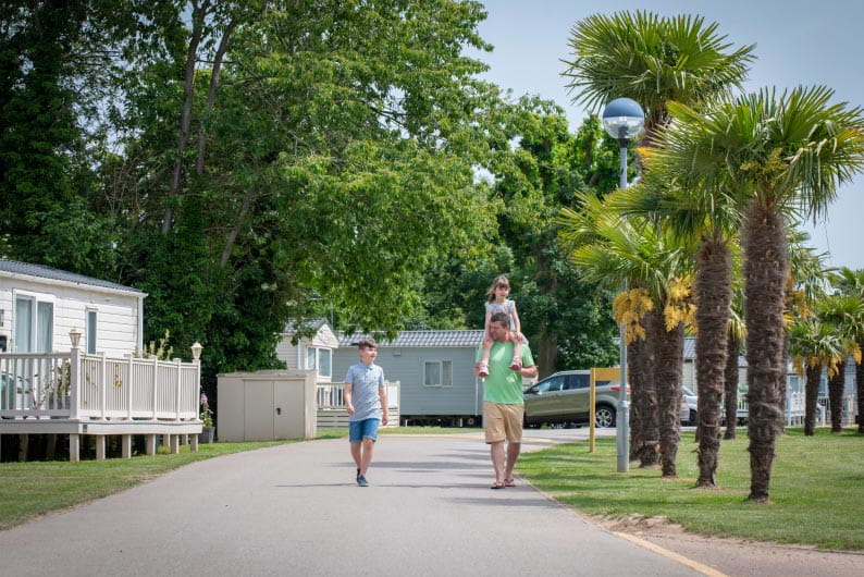 a family walking through the park