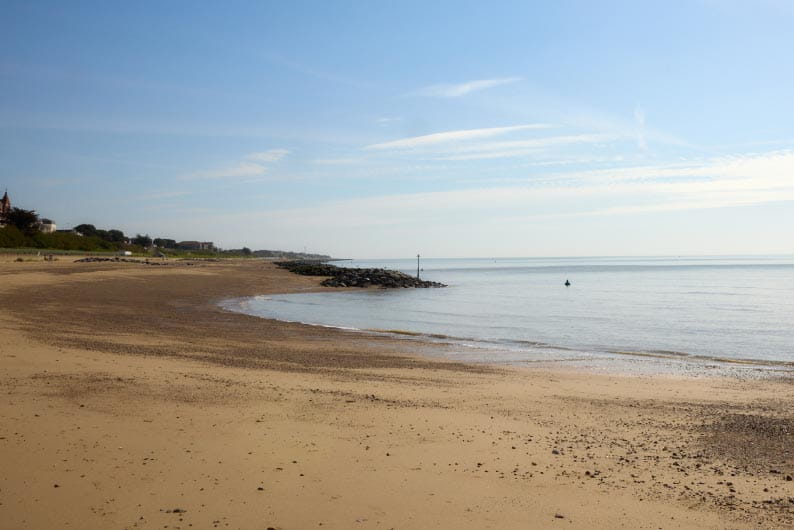 a panoramic view of a sandy beach
