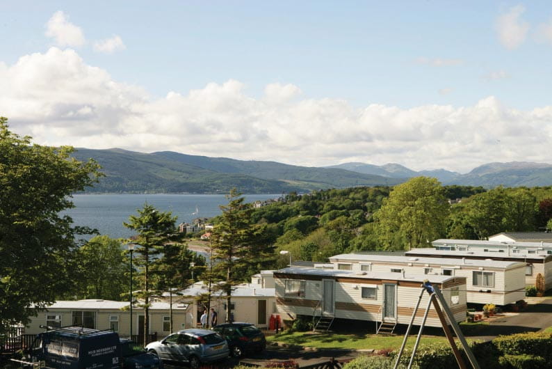 a countryside caravan park with sea views