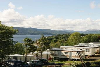 a countryside caravan park with sea views