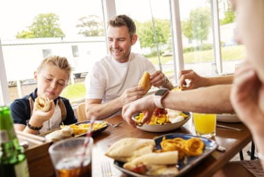 a family enjoying a meal at the restaurant