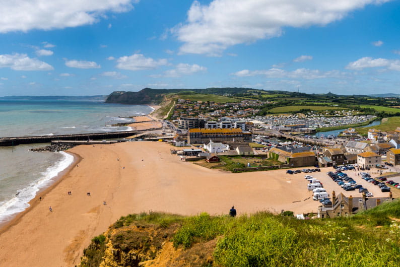 West Bay holiday park located on the edge of a beach