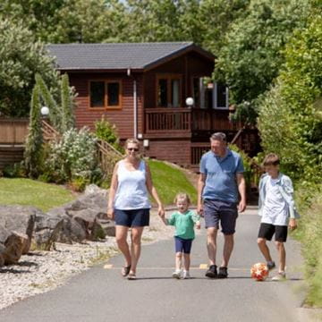 a family walking through the park