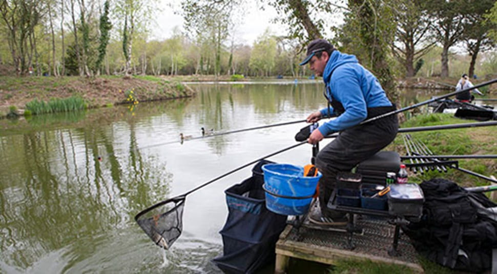 angler fishing on a lake