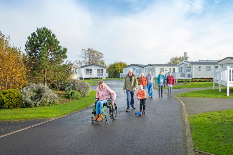 a family walking through the park