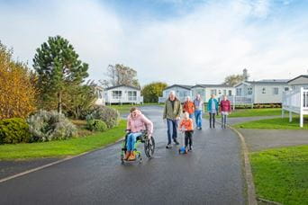 a family walking through the park