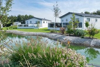 Lodges sitting alongside the river
