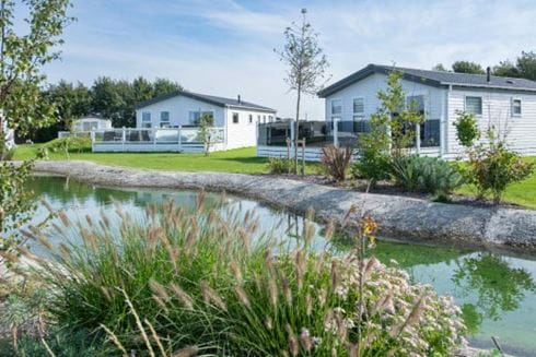 Lodges sitting alongside the river