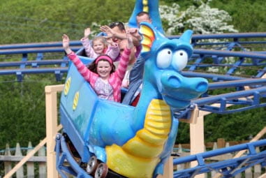 Children on a dragon ride at Camel Creek Adventure Park