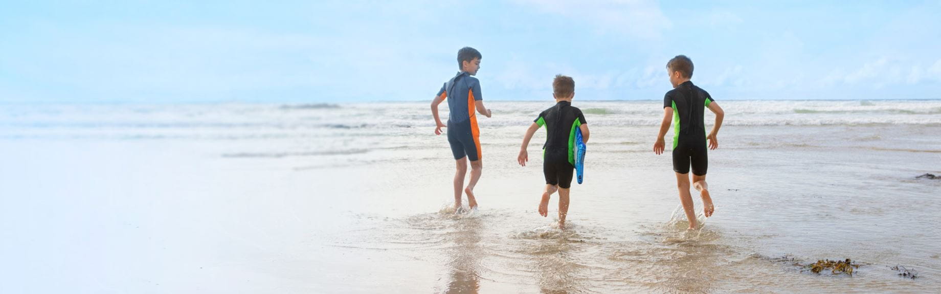 Children running on beach