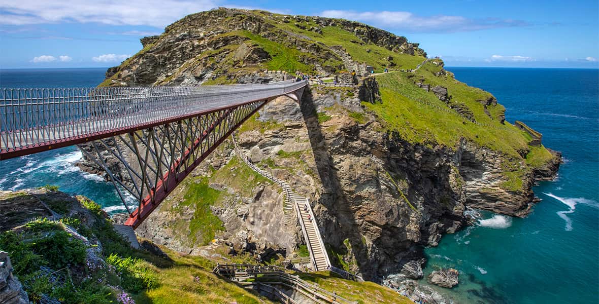 A footbridge crossing to an island on Cornwall's coast