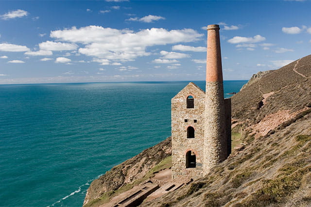 The ruins of a historic tin mine in Cornwall overlooking the sea