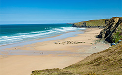 Waves crashing at Watergate Bay Beach in Cornwall