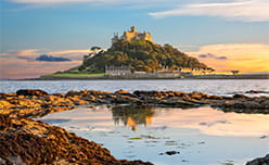 Sunset over St Michael's Mount island off the coast of Marazion in Cornwall