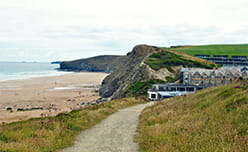 A path leading down to the beach at Watergate Bay in Cornwall