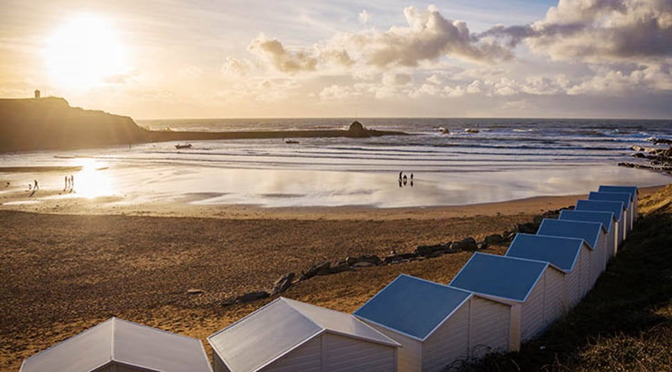 Bude beach huts at sunset