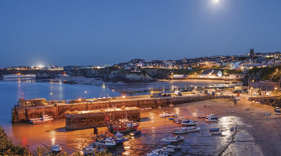 Night time view boats ands harbour at Newquay