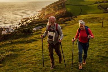 Couple hiking through Devon