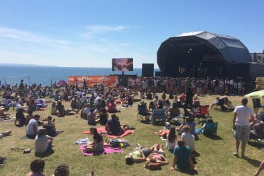 Crowd standing in front of stage for Oceanfest