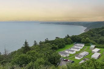 Lodges overlooking the sea at Bideford Bay Holiday Park in Devon