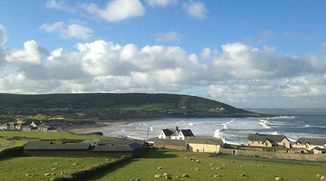 View of a sunny beach in Devon