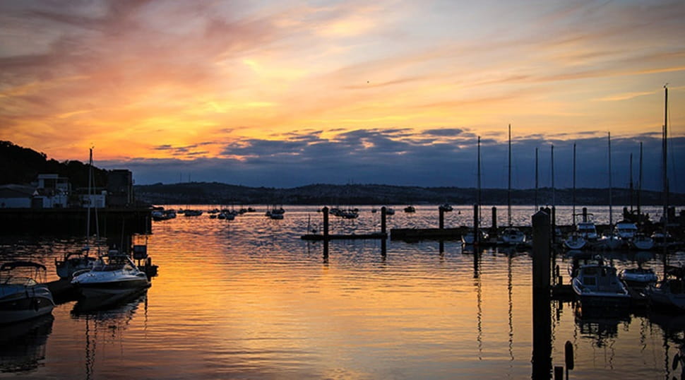 Brixham harbour at sunset