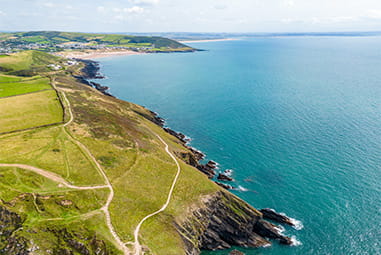 The view over Croyde Bay in Devon on a sunny day